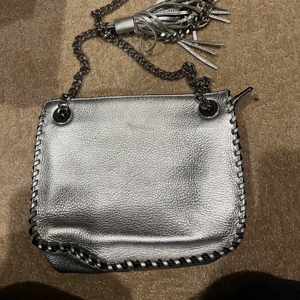 Michael Kors silver handbag with heavy chain strap